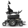 Extreme X8 Power Wheelchair navigating rugged outdoor terrain with knobby tires and a sturdy design, built for sand, snow, and off-road adventures.