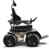 Extreme X8 Power Wheelchair navigating rugged outdoor terrain with knobby tires and a sturdy design, built for sand, snow, and off-road adventures.