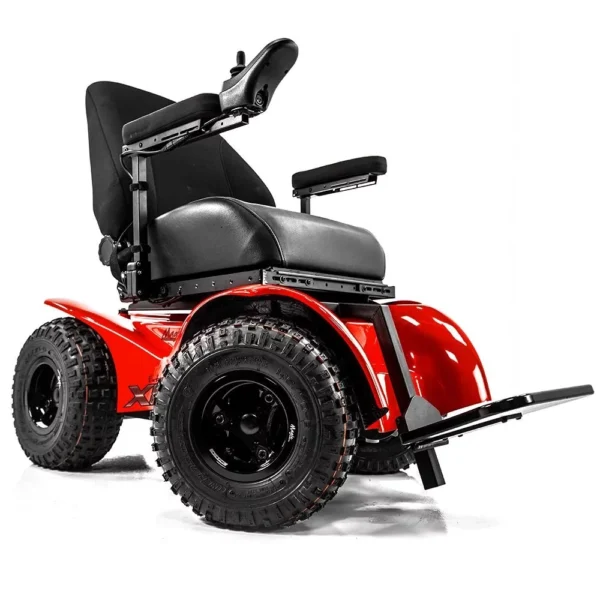 Extreme X8 Power Wheelchair navigating rugged outdoor terrain with knobby tires and a sturdy design, built for sand, snow, and off-road adventures.