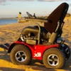 Extreme X8 27 Extreme X8 Power Wheelchair navigating rugged outdoor terrain with knobby tires and a sturdy design, built for sand, snow, and off-road adventures.