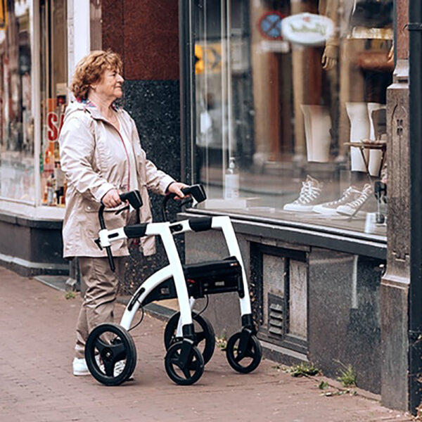 Rollz Motion Performance in jungle green, featuring a padded seat, pneumatic rear tires, and foam-filled front tires for smooth all-terrain mobility.