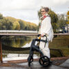 Rollz Motion Rhythm rollator walker with laser line, metronome, and vibration cues, designed for Parkinson’s patients to improve walking rhythm and overcome freezing of gait.