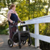 Rollz Motion Rhythm rollator walker with laser line, metronome, and vibration cues, designed for Parkinson’s patients to improve walking rhythm and overcome freezing of gait.