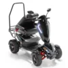 Vita Monster all-terrain mobility scooter in midnight black, featuring 15” rear tires, 900-watt motor, LED lights, and sporty captain's seat for outdoor performance.