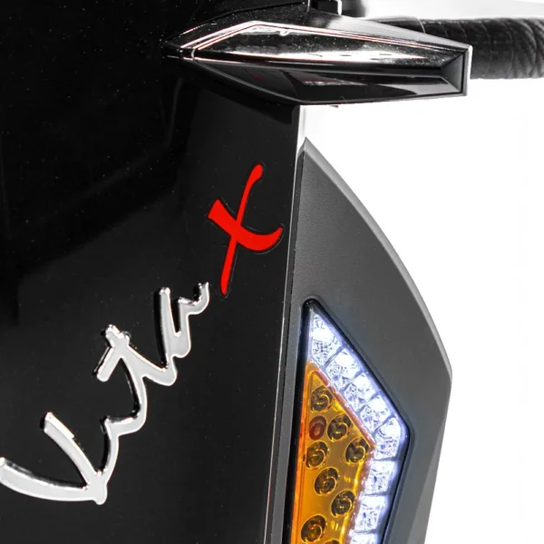 Vita Monster all-terrain mobility scooter in midnight black, featuring 15” rear tires, 900-watt motor, LED lights, and sporty captain's seat for outdoor performance.