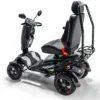 Vita Monster all-terrain mobility scooter in midnight black, featuring 15” rear tires, 900-watt motor, LED lights, and sporty captain's seat for outdoor performance.
