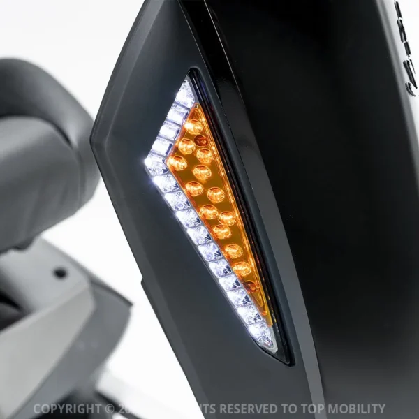 Vita Monster all-terrain mobility scooter in midnight black, featuring 15” rear tires, 900-watt motor, LED lights, and sporty captain's seat for outdoor performance.