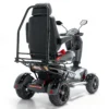 Vita Monster all-terrain mobility scooter in midnight black, featuring 15” rear tires, 900-watt motor, LED lights, and sporty captain's seat for outdoor performance.