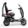 Vita Monster all-terrain mobility scooter in midnight black, featuring 15” rear tires, 900-watt motor, LED lights, and sporty captain's seat for outdoor performance.