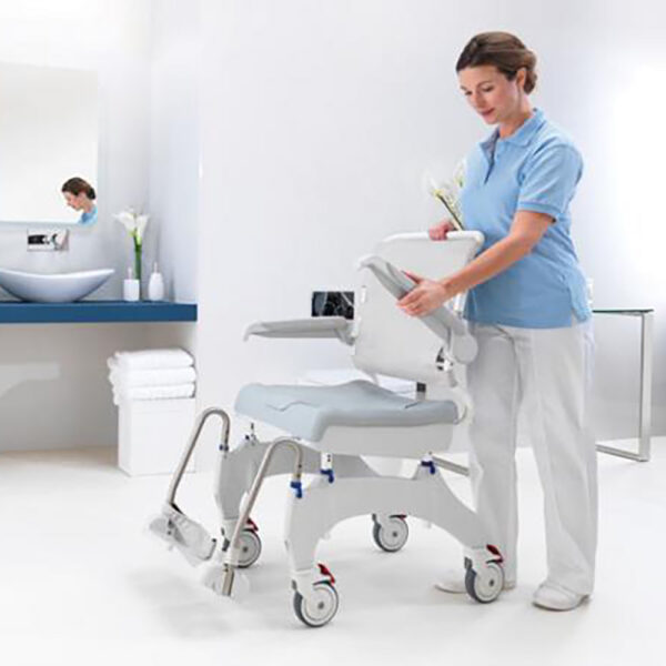 Aquatec Ocean Ergo XL Shower Commode Chair with ergonomic seat, rust-proof frame, and adjustable footrests.