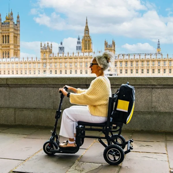 eFOLDi Lite ultra-lightweight folding mobility scooter with a magnesium alloy frame, designed for easy transport and travel.