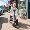 eFoldi Lite 6 eFOLDi Lite ultra-lightweight folding mobility scooter with a magnesium alloy frame, designed for easy transport and travel.