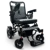 IQ7000_Black_Frame_Gray_Textile Majestic IQ‑7000 electric wheelchair with remote control, padded seat, folding frame, and large rear wheels—ideal for travel and everyday use.