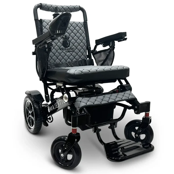 Majestic IQ‑7000 electric wheelchair with remote control, padded seat, folding frame, and large rear wheels—ideal for travel and everyday use.