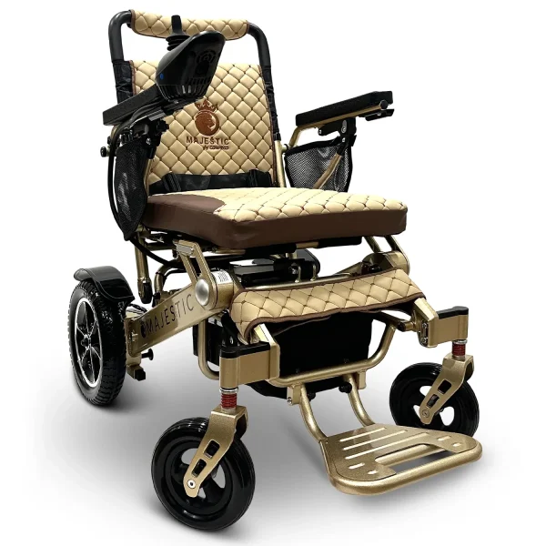Majestic IQ‑7000 electric wheelchair with remote control, padded seat, folding frame, and large rear wheels—ideal for travel and everyday use.