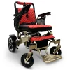 IQ7000_Bronze_Frame_Red_Textile Majestic IQ‑7000 electric wheelchair with remote control, padded seat, folding frame, and large rear wheels—ideal for travel and everyday use.