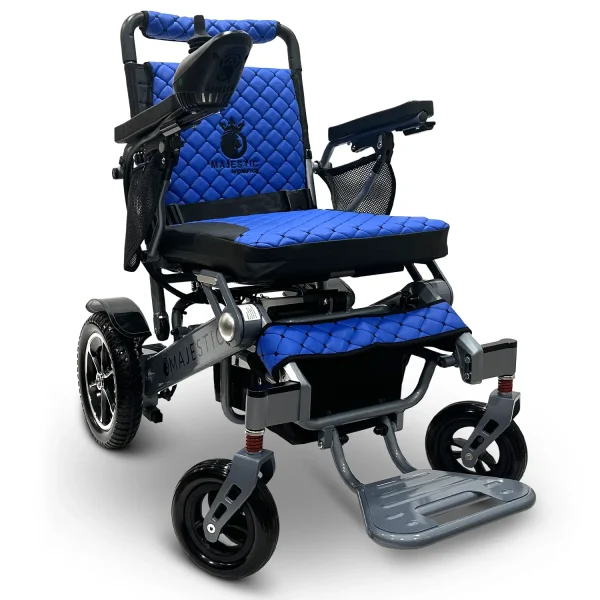 Majestic IQ‑7000 electric wheelchair with remote control, padded seat, folding frame, and large rear wheels—ideal for travel and everyday use.